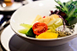 Sliced Tomatoes and Fruits on White Round Bowl