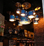 Drum Lights at HardRock Chandelier Old drums recycled as lights how cool!