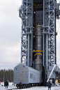 Swarm upper composite hoisted to the top of the service tower 