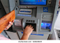 hands holding leather wallet, withdrawing some cash from ATM in Yogyakarta, 5 February 2023
 编辑库存照片