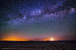 Photograph Moonrise, the Milky Way and a City Far Away by Knate Myers on 500px