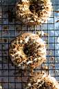 Cinnamon Bun Style Baked Donuts! Moist and fluffy cinnamon bun donuts that are covered in cinnamon glaze, cinnamon crumbles, and vanilla frosting. #dessert #donut #doughnut #sweet #cinnamondesserts-n-sweets.tumblr.com