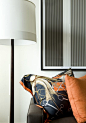 Pillows made from vintage Hermes scarves by Atlanta interior designer Robert Brown.