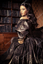 Renaissance Style -  beautiful young woman in the lush expensive dress in an old palace interior. Vintage style. Fashion.