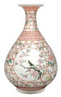 A large Famille Rose baluster-shaped vase China, Yung-chêng period (1723-1735). Porcelain, bellied body, decor of 3 cartouches with birds and blooming branches, with golden lattice work in ironred. The top and egde with ironred ornament border. Wooden sta