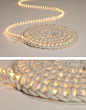 What a cool idea. Crochet around a rope light to create a light-up rug. Great for a covered patio outside at night.: