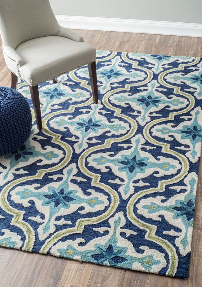 客厅沙发浅蓝色地毯效果图