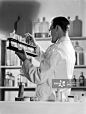 Chemist working in a laboratory 1949.