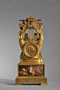 EXCEPTIONAL CLOCK with winged women, in ormolu, she has two opposite hand of winged women and other movement forming the arms of the lyre. Emerging from rich and thick foliage they bear the yoke adorned with a laurel wreath. The attachment of the seven-st