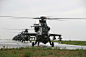 直10武装直升机冒雨训练