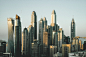 A cluster of tall skyscrapers in downtown Dubai