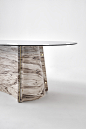 Designer Dining Table for the Living Room Elitra - Lithos Design : Elitra is a bold designer dining table in marble with brass inserts. Available in the rounded version, and in the elliptical one with Elitra XL.