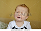 crying baby with sad face - stock photo