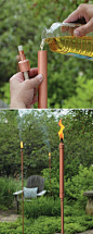 DIY Tiki Torches • Lots of Ideas and Tutorials! Including from 'my home my style', these sleek, modern looking Copper Patio Torches.: 