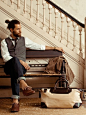 Not one for beards but he's rockin' it. Beard + ponytail + vest + Ernest Alexander weekend bag ... lovely!