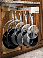 This dreamy drawer organizer mounts to the top of any base cabinet and arrays your pots and pans (and their lids) on a single extending rack with adjustable hooks. Dual glides on ball bearings make it one smooth operator. Pull-Out cookware Storage, by @gl