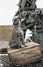 A rare light hearted view of war. A German Flak crew photo of their regimental mascot sitting by a 88mm, FlaK 36. Flugzeugabwehrkanone (aircraft-defense cannon): 