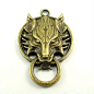 Werewolf jewelry connector.  Large focal piece.  Would look cool with it's eyes painted red- devil dog-ha! wolf  Bronze Tone Wolf Head Charm Pendant necklace by pinksupply, $2.75: 