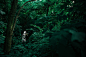 Person in White Suit With Helmet in Forest