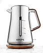 Krups Chrome & Wood BW600 Electric Kettle  Smart-looking, this sophisticated electric kettle brings style and top service into your space. The shimmering stainless steel, chrome and wood optics construction catches the eye and makes serving a spot of 