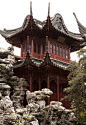 豫园 Classical Chinese garden from Ming Dynasty featuring intricate roof sculptures and rocks harvested from distant lakes Hujing Tower by IceNineJon, via Flickr