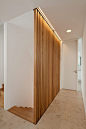 | DETAILS | Wooden slats as bannister. Wohnhaus W. by Berschneider+Berschneider Architekten. lovely wood detail to allow light to transfer through into the lower staircase #stairs #stairs: 