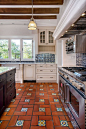 love the floors, but plain painted walls with just matching tile backsplash with stove