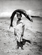 andreibel4ev:

Senegal, Boy and Fish, Angela Kesp
