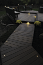 Light the night for you and your guests with TimberTech Decking and Lighting. This deck is from our Legacy Collection in Tigerwood with Mocha accents. #timbertechdeck #timbertechlighting #mytimbertech