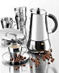 Stainless steel espresso maker with cups and saucers make a brilliant presentation: 