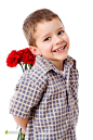 拿红色康乃馨的小男孩人物摄影高清图片