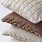 Luxurious, sleek forest green quilted leather pillow Motum cushion in rectangular shape