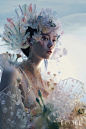 close-up a beautiful Asia girl with a modern/technical look stands in a flowerbed， detailed facial features, detailed eyes,，She is wearing a transparent long dress made of crystal and glass, surrounded by various futuristic flowers and plants. The materia