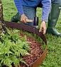 Landscape Edging: 10 Easy Ways to Set Your Garden Beds Apart: EverEdge Edging - Made from sturdy, powder coated flexible steel with 3-3/4" spikes, EvrEdge appeals with its casual, country garden look. Lengths are interlocking for seamless installatio