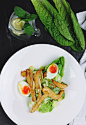 Salad with sauteed chicken, soft boiled eggs, and lettuce