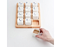 来自上海E Square设计室的小键盘咖啡杯（Keyboard Coffee Cups），一个木托盘，拖上12个咖啡杯，每一个都是有 个ID的，朋友多了就不会拿错杯子了
