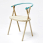 The backrest of this chair by Dutch designers Oato seems to be simply wedged between its criss-crossing legs