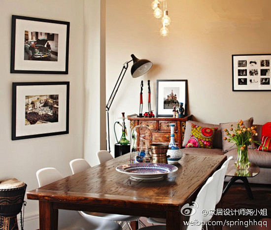 家居设计师尧小姐餐桌选用漆木的材质，古朴...