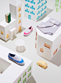 Summer in the (papercraft) city | KaDeWe : We had great fun creating this papercrafted city for KaDeWe magazine.We where commissioned to create a white papercraft city for their YOUNG collection.