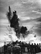 The crew of the USS Duane, a cutter of the US Coast Guard, can be seen here dropping depth charges on a German U-Boat in the North Atlantic - 17 April 1943

It is likely that this is of the same event where the USS Duane and the USS Spencer destroyed U-17