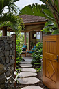 looking through gate down tropical pathway to guest bedroom lanai, private estate, kailua-kona, hawaii, by mclaughlin & associates archticts...: 