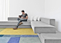 Cantilevered sofas by Paulo Kobylka fit together like concrete slabs