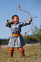 Young Mongolian archer at Nadaam festival in Tsagaannuur, Mongolia.: 