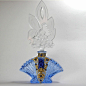 This tall Czech perfume from the 1920-30s era has a blue cut crystal base & a clear stopper.