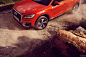 Audi Q2 coral orange : Audi Q2 with coral orange paintjob offroad and urban