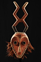 Africa | Horned mask "giphogo" from the Pende people of DR Congo | Wood, red, black and white paint, plant fiber
