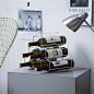 Minimalist Wine Rack | Wine Storage | The Little Cork : The golden honeycomb wine rack is perfect for anyone pursuing a minimalistic lifestyle. The geometric design portrays simplicity and is fashion-forward. It will hold up to 6 bottles of wine and look 