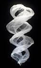 k452fkc534_3D_render_of_a_translucent_glass_ribbon_glowing_in_t_47da3eb3-1f83-49bd-9266-3695e901f694.png (848×1392)