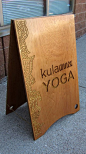 Sandwich board for local Yoga Studio.  Meranti Ply carved with CNC Stainless and brass hardware.