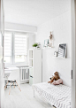 Plush Toys on Top of White and Grey Mattress Inside Bedroom